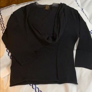 Beautiful, classic black top with sheer detail